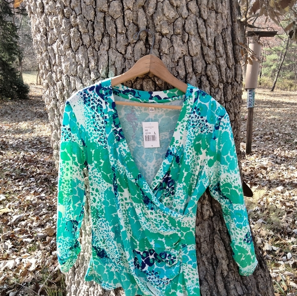 CAbi Tops - 🌬️🥶Price Drop!🥶🌬️NWT Cabi wrap blouse in size L.